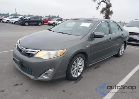 2014 Toyota Camry Hybrid Xle z USA, uszkodzony, nr VIN 4T1BD1FKXEU113705